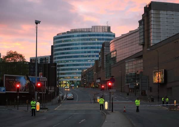 Dawn over Manchester after the attack. Peter Byrne/PA Wire