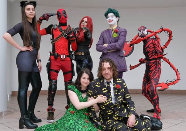 Comic-Con regulars Lee Burns and and Kirsty Walkden (front) are having part of their wedding day at this year's event