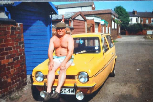 Ronnie Peet with his Reliant Robin