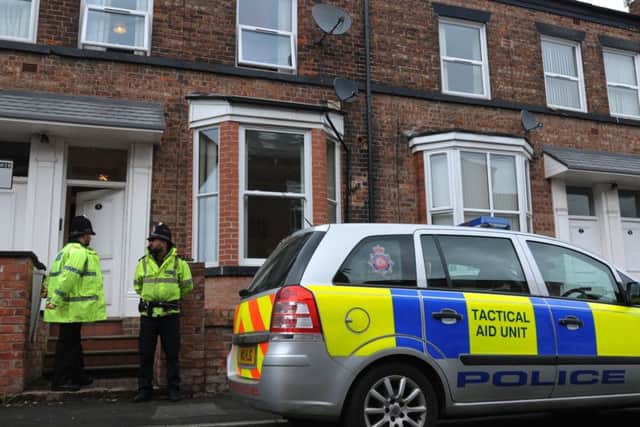 Police still searching a property on Springfield Street, Swinley, Wigan, in connection with the Manchester suicide bomber.