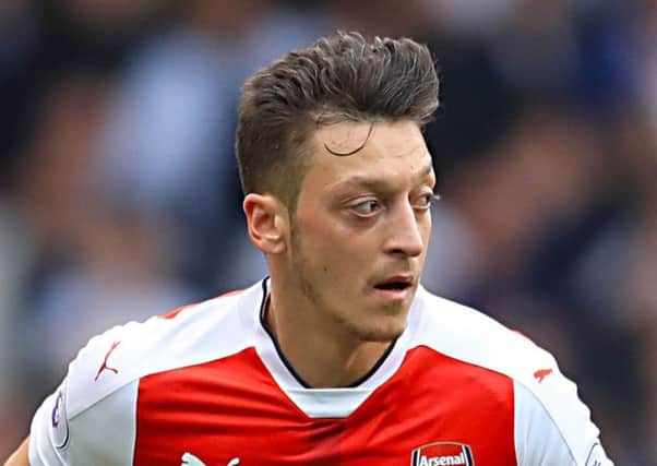 Mesut Ozil is reportedly ready to sign a new deal with Arsenal