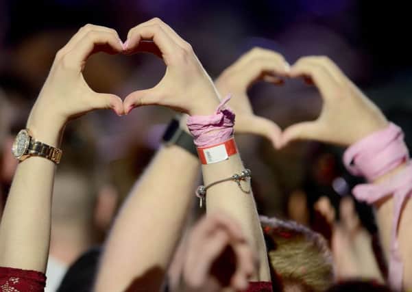 Teenagers in the crowd during the One Love Manchester benefit concert