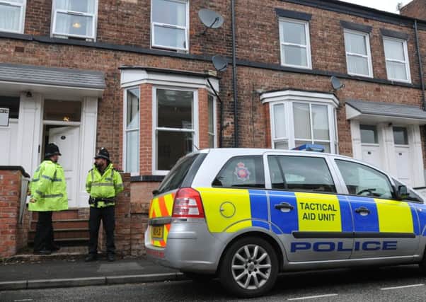 Police searching a property on Springfield Street, Swinley, Wigan, in connection with the Manchester suicide bomber