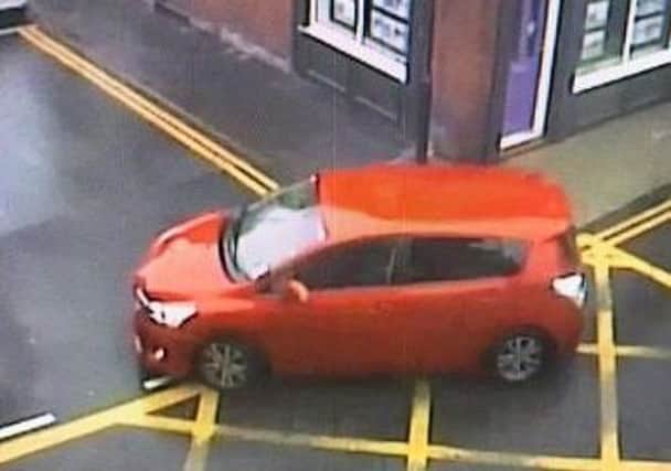 CCTV of a car wanted in connection with a Post Office robbery in Tyldelsey