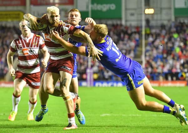 Sam Tomkins will return to action at the venue where he played his last game, Warrington
