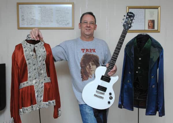 T-Rex fan Mark Sheehan with some of Marc Bolan's clothes and handwritten poems