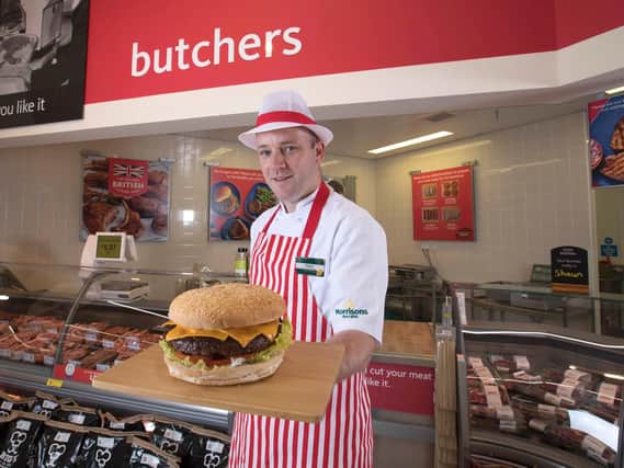 Morrisons Butcher Shaun Speight with the Daddy of all Burgers