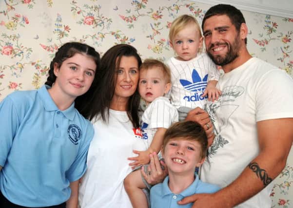 Rebecca Jewitt and husband Lee with children, Isobella, 11, left, twins Oliver and Noah, two, and Oscar, seven