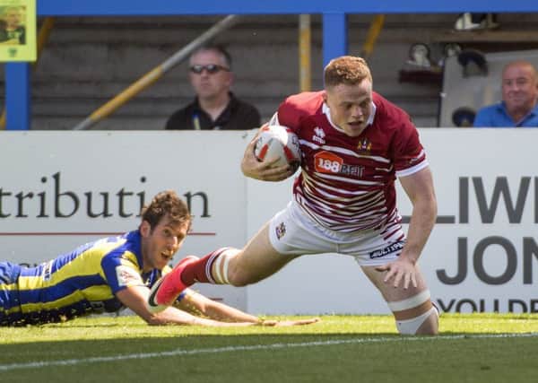 Joe Burgess crossed for Wigan's first two tries
