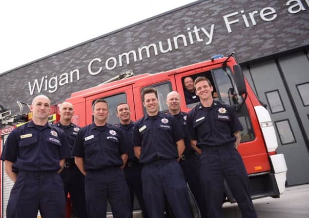 Firefighters on their first day in the new Wigan Community Fire And Ambulance Station