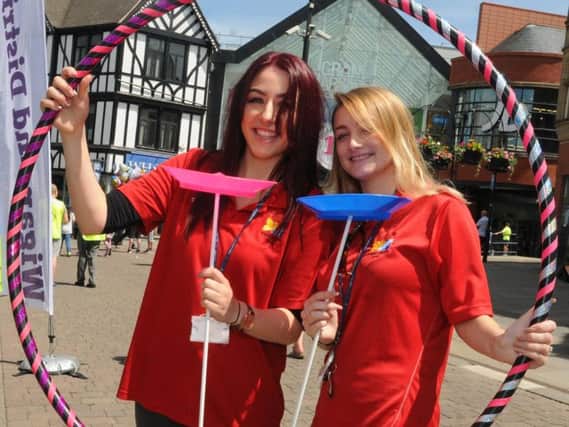 Charities and community groups offer information and raise funds at the Wigan Rotary Club Community Day in Wigan town centre