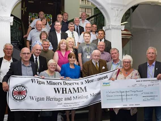 Coun David Molyneux, WHAMM chair Sheila Ramsdale, councillors, members of WHAMM and supporters of the mining statue appeal