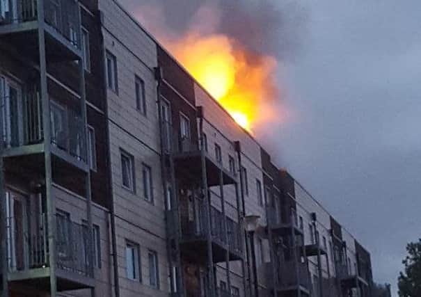 Flames at the Wharfside flat fire. Photo supplied by Stuart Alker