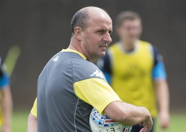 Paul Cook will take charge for the first time