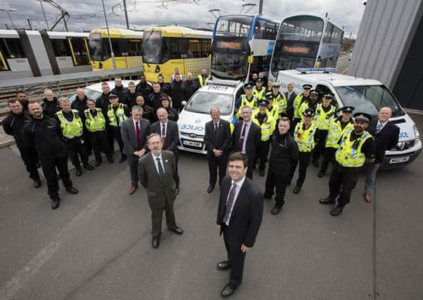 Andy Burnham, police and transport chiefs
