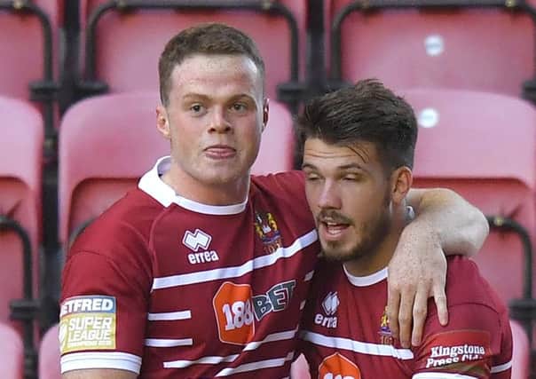Oliver Gildart (right) scored two tries