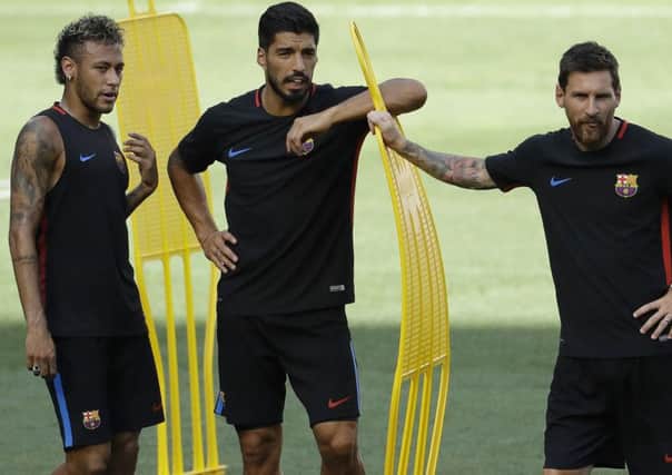 Have Luis Suarez and Lionel Messi persuaded Neymar to remain with Barcelona?