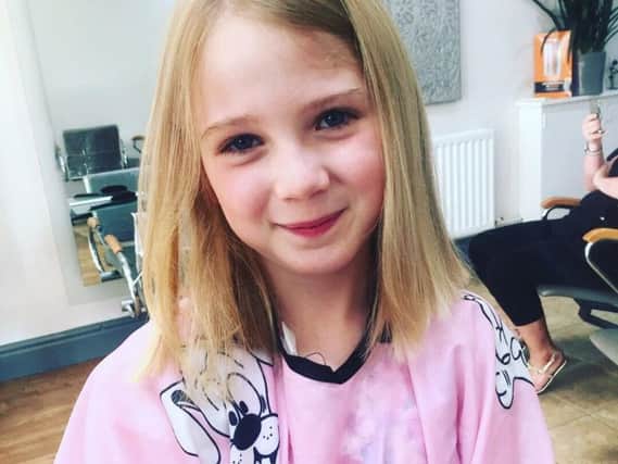 Ava Stones with her new hair cut
