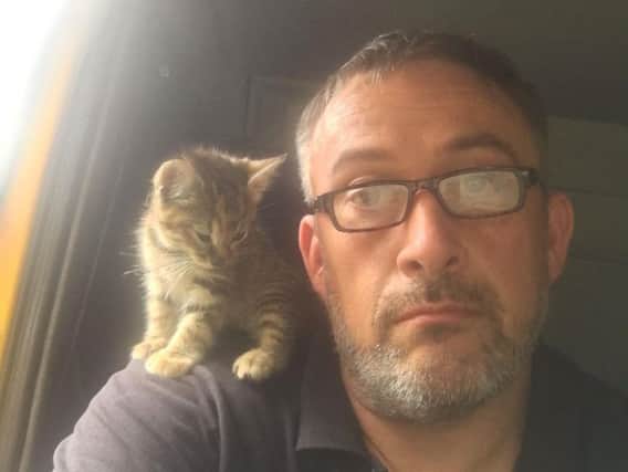Paul Gibbons with Gracie the kitten