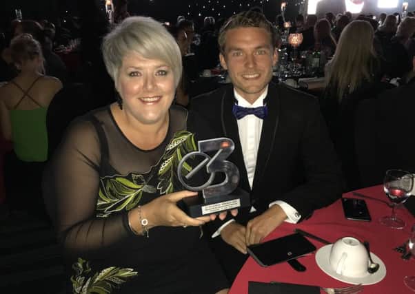 Bridgewater Home Care operations manager Emma Woodward and MD Phil Eckersley celebrate their Best Employer in Care Award 2017 at the North West E3 Business Awards