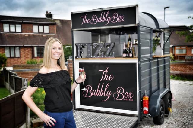 Rachael Buckley pictured with The Bubbly Box which is being launched at her Billinge home. It is a converted horse box from which they now sell Prosecco and Champagne NB The Bubbly Box couldn't be moved and husband didn't want to be on the pictures