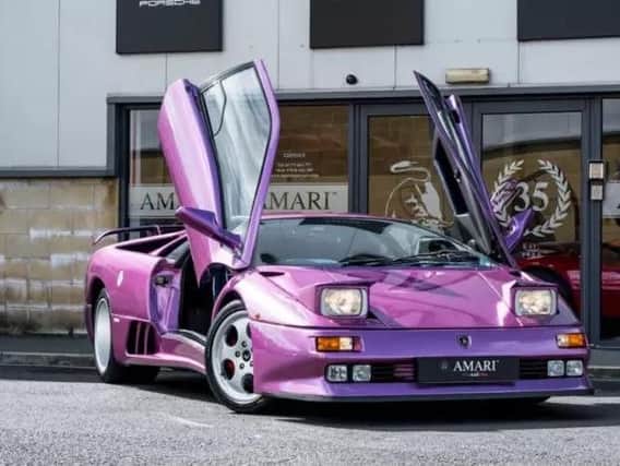 The bright viola Lamborghini originally owned by Jamiroquai's Jay Kay