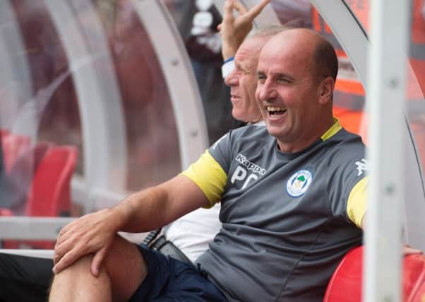 The appointment of Paul Cook has been met with the
approval of Latics fans