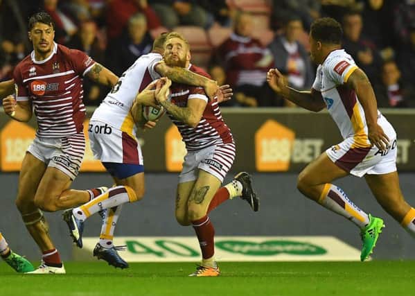 Sam Tomkins is collared