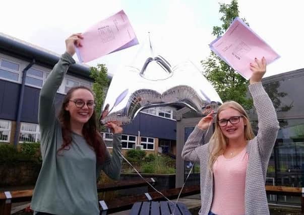 Winstanley College students Sophie and Ellie celebrate