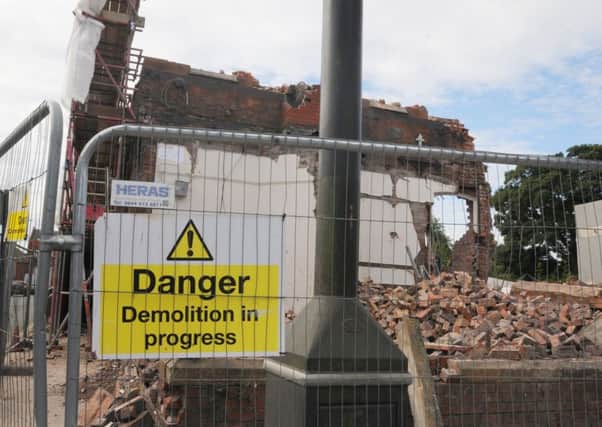 WIGAN  16-08-17
The building previously known as Ashton Town Hall, is being demolished to make way for a controversial new health centre on Bryn Street, Ashton-in-Makerfield.
