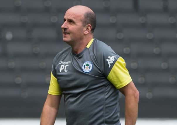 Paul Cook has warned Oldham will carry a threat today when they host his Wigan Athletic