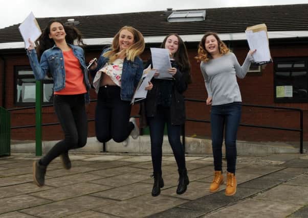 Celebrations as students get their GCSE exam results at Standish Community High School