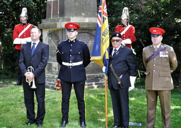 The Wigan-based Queens Own Yeomanry Reserve Unit guard the monument