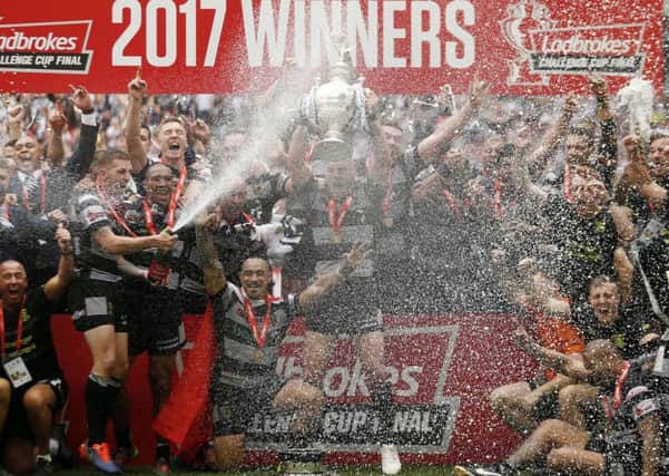 Hull FC celebrate with the Challenge Cup