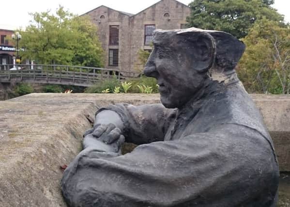 The vandalised statue at Wigan Pier