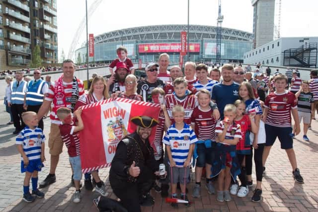Thousands of fans enjoyed Wembley... but many more stayed away