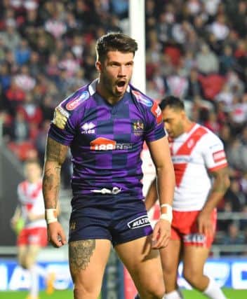 Wigan Warriors' Oliver Gildart celebrates scoring his sides 1st try
Betfred Super League match at the Totally Wicked Stadium, St Helens. Picture by DAVE HOWARTH for Bernard Platt. Picture date: Friday September 1, 2017