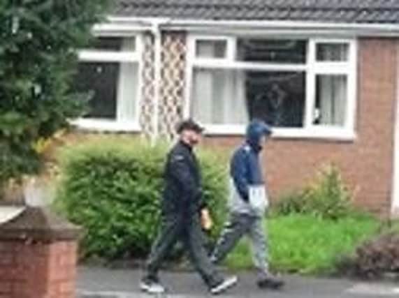 Police would like to speak to the two youths in this image