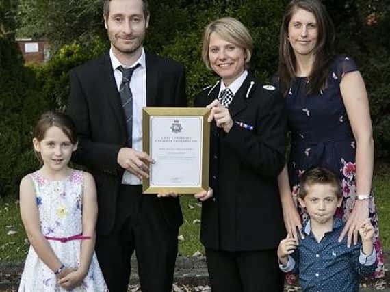 Paul and Claire Goulden with their children Neve and Daniel - with Assistant Chief Constable Vanessa Jardine