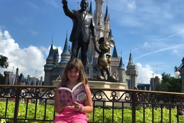 Bethany Crossfield reads at Disney World Florida