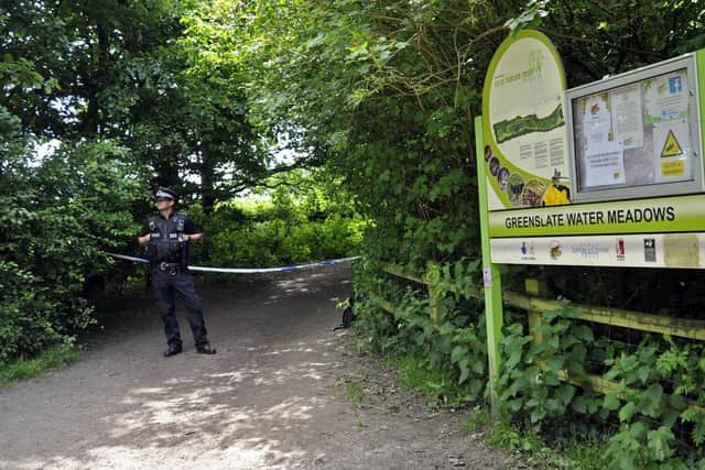 A police officer near to the scene where Ellen's body was discovered