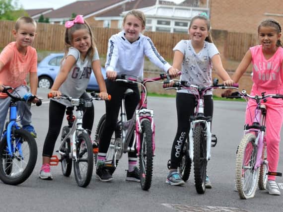 Young cyclists Rowan Thomas, six, Rebecca Fairhurst, seven, Megan Boland, eight, Rachel Fairhurst, nine, and Evie Thomas, eight