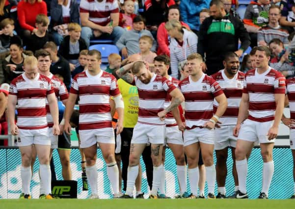 Wigan players look dejected