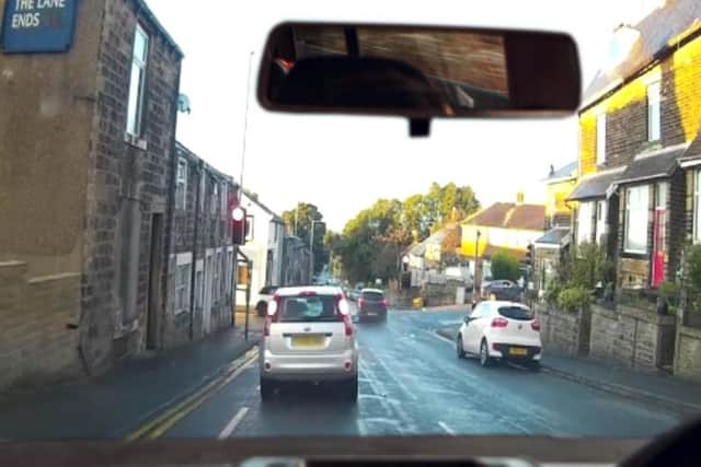 Shocking footage shows the moment a driver speeds through red light in ...
