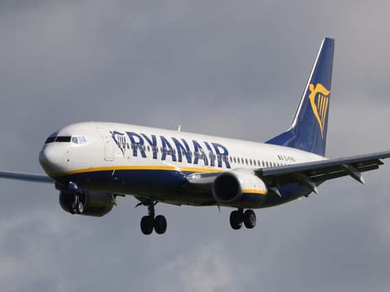 Ryanair says flight cancellations were brought about because of an error with pilot holiday rosters
