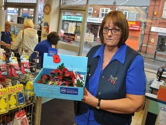Linda Wallace, manager at Gee-Tees shop, Pemberton, where a thief broke into the shop to take the Royal British Legion poppy appeal box