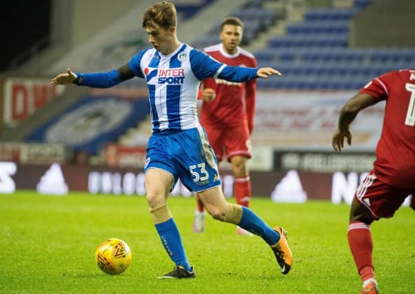 Jensen Weir became Latics youngest ever player last 
Tuesday night