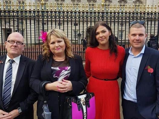 Trevor and Sheila Faihurst with son Michael and his partner Shelley outside Buckingham Palace