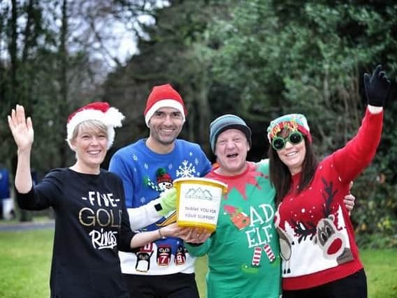 Ruth Brookes, Nick Brookes, Keith Irwin and Janet Mitchell at last years parkrun event with The Brick
