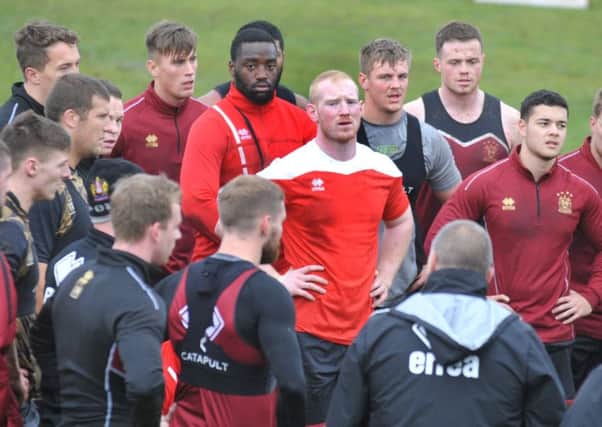 Liam Farrell takes a breather with his team-mates during training last week
